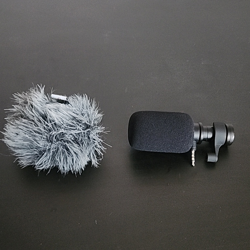 Compact Black Shotgun Microphone with Wind Muff